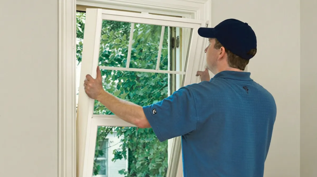 Professional contractors performing a residential window insulation and replacement service in Fort Collins, CO
